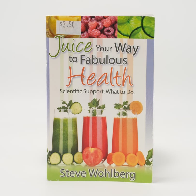 Book cover for "Juice Your Way to Fabulous Health" with three glasses of colorful juices and fresh produce.