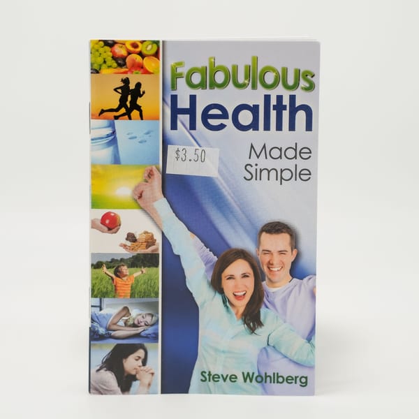 Fabulous Health Made Simple book with images of healthy living and smiling people.