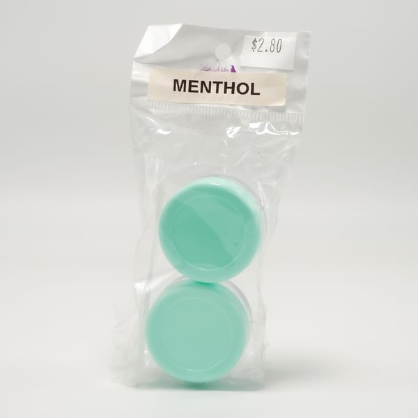 Two light blue menthol containers are packaged in clear plastic with a $2.80 price tag.