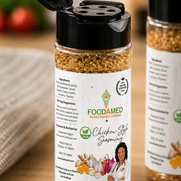 Close-up of Foodamed Vegan Chicken Style Seasoning bottle with ingredients and a doctor's image.
