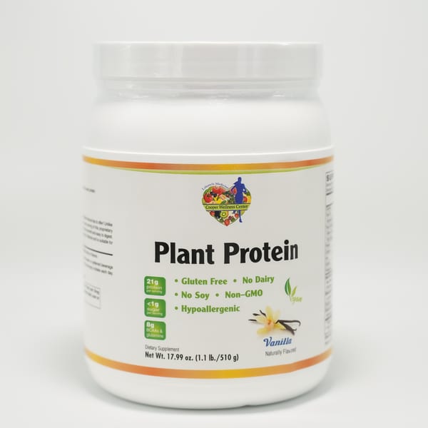White container of Cooper Wellness Center Vanilla Plant Protein powder on a white background.