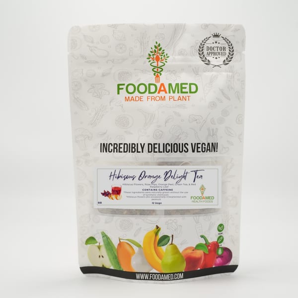 A white Foodamed tea pouch with a "Doctor Approved" seal and colorful fruit and vegetable illustrations.