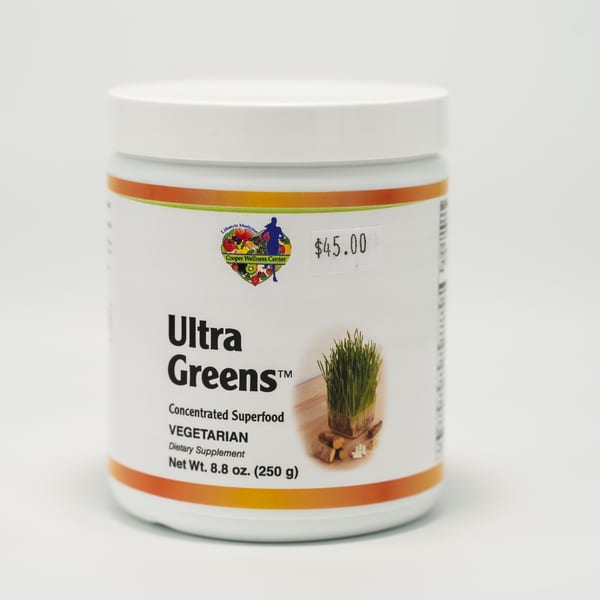 White container of "Ultra Greens" concentrated superfood dietary supplement with a $45 price tag.