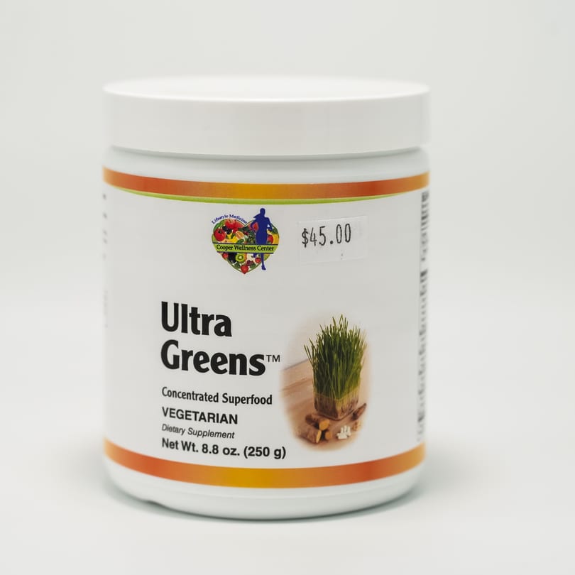 White container of "Ultra Greens" concentrated superfood dietary supplement with a $45 price tag.