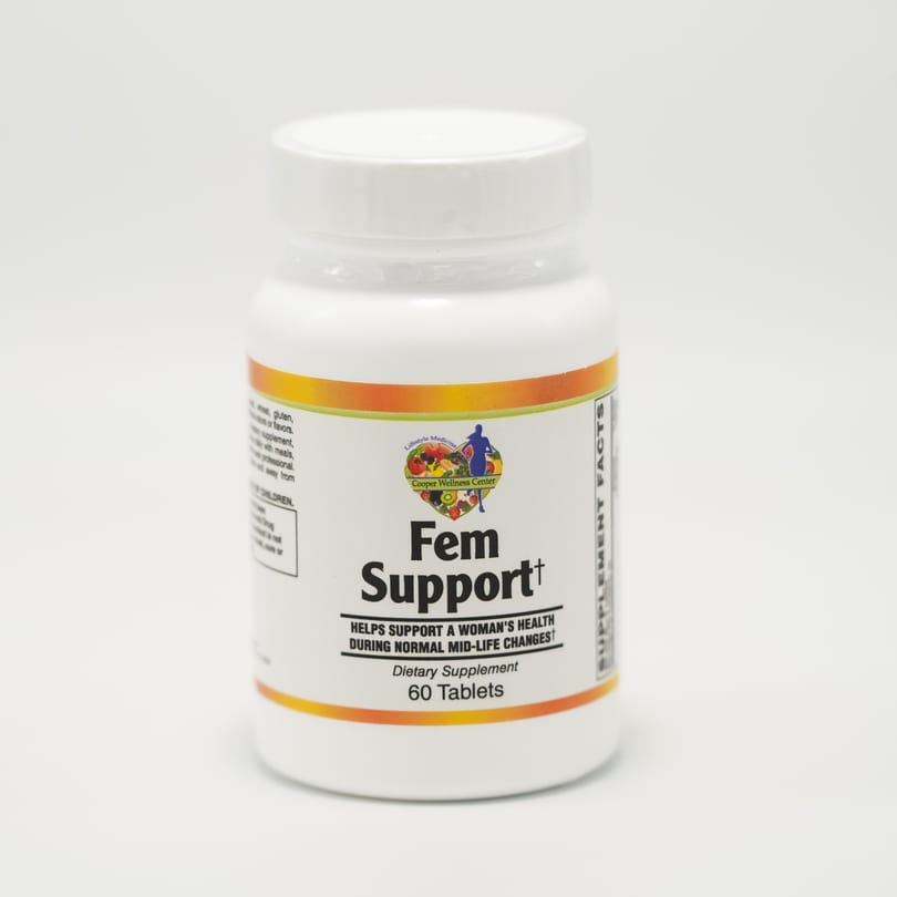 A white bottle of "Fem Support" dietary supplement with a Cooper Wellness Center logo.