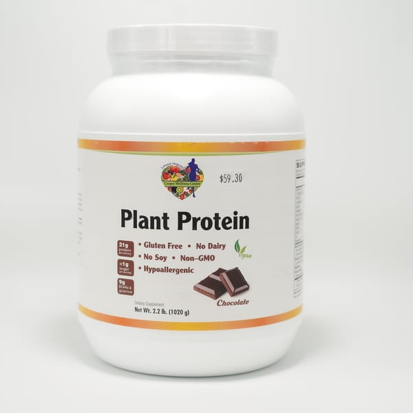 A white tub of Cooper Wellness Center chocolate plant protein powder with a $59.30 price tag.