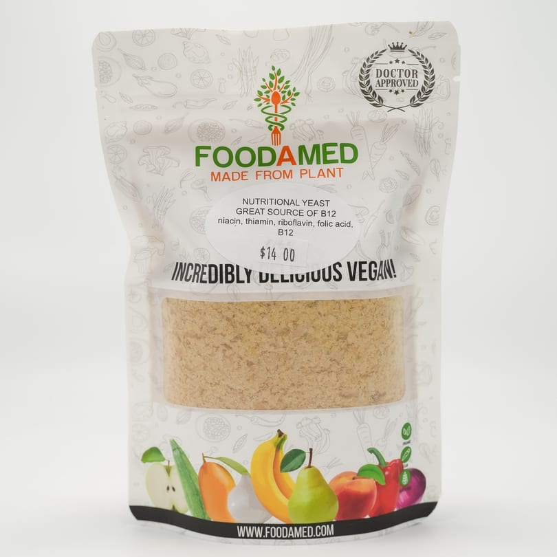 Foodamed nutritional yeast in a white pouch with a clear window, displaying the product and label.